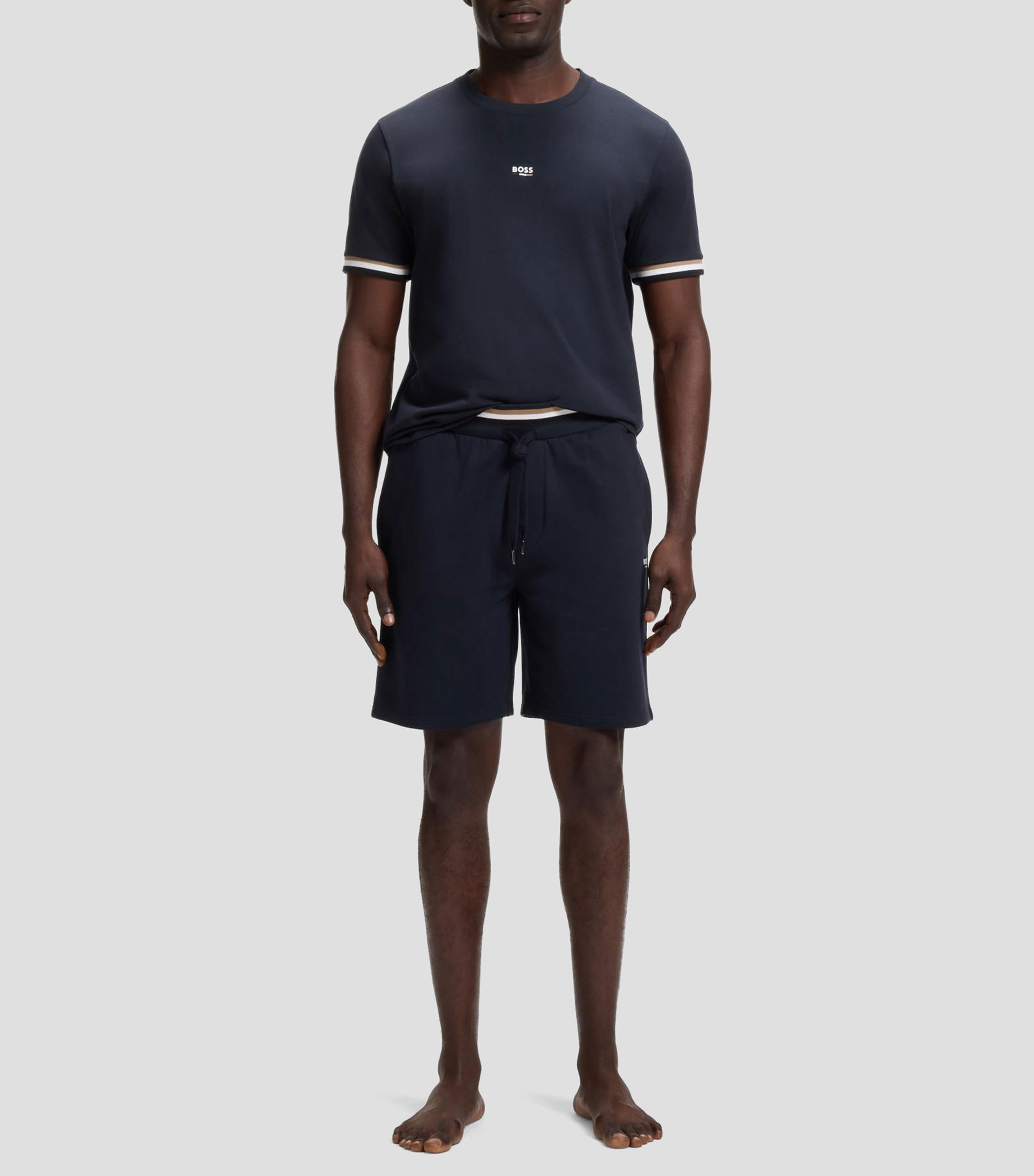 Playera de algodón con rayas distintivas y logo Hombre